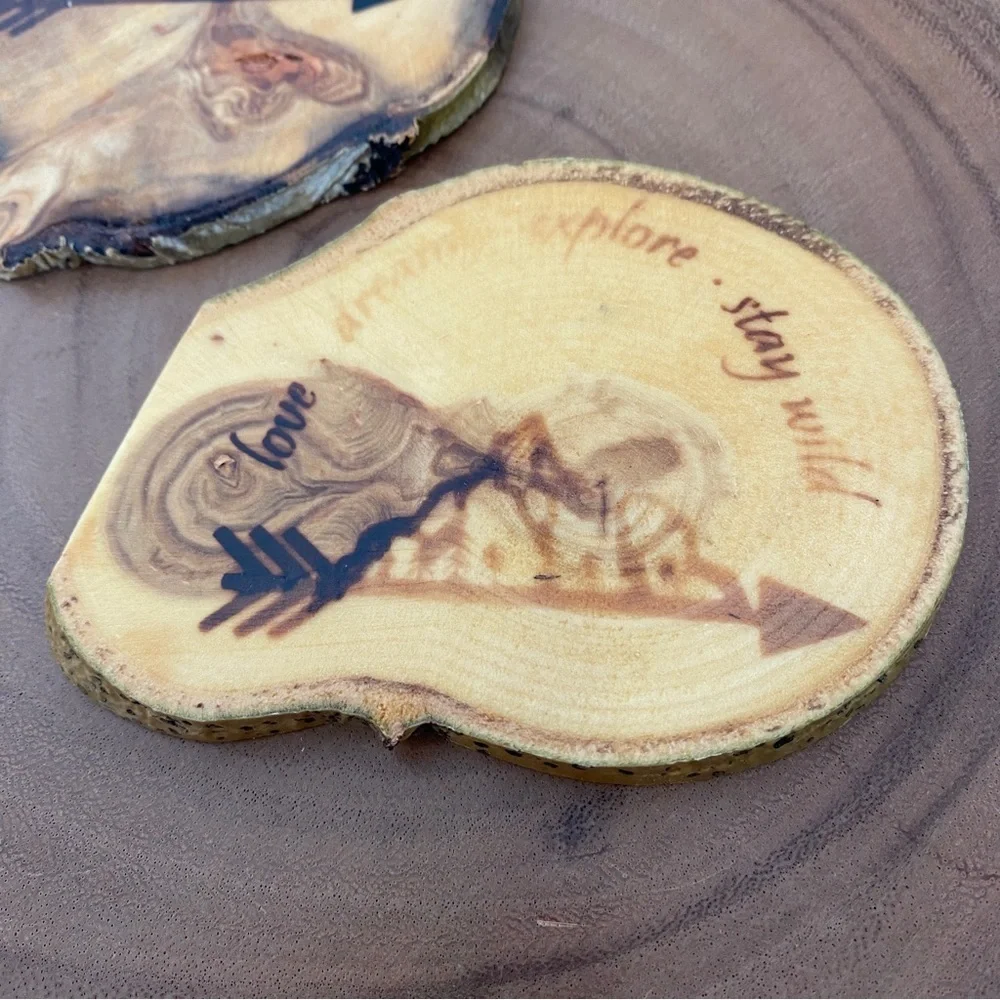 Set of two coasters burned wood love dream explore stay wild mountains irregular